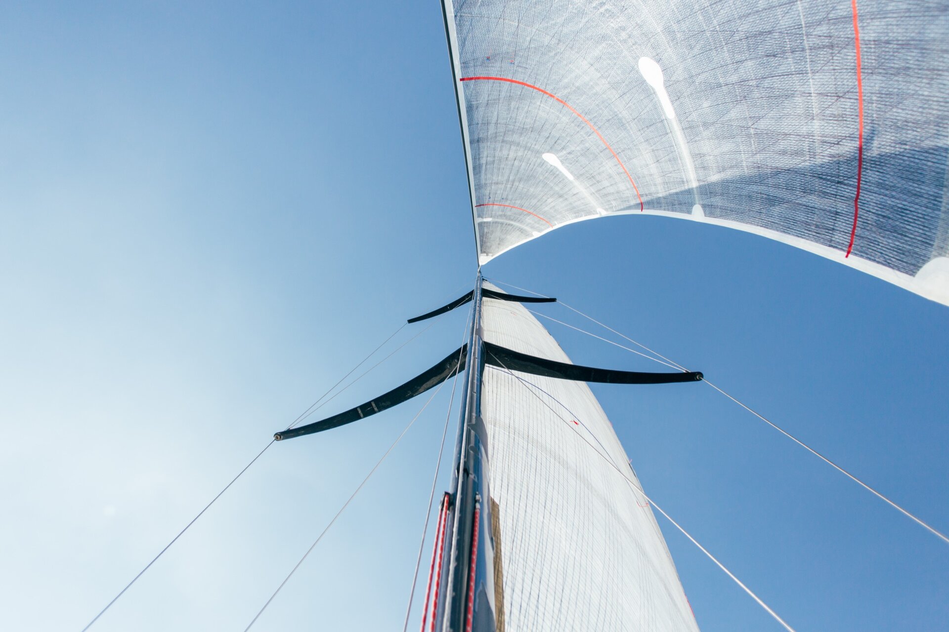 Sailing boats with full sails in strong wind